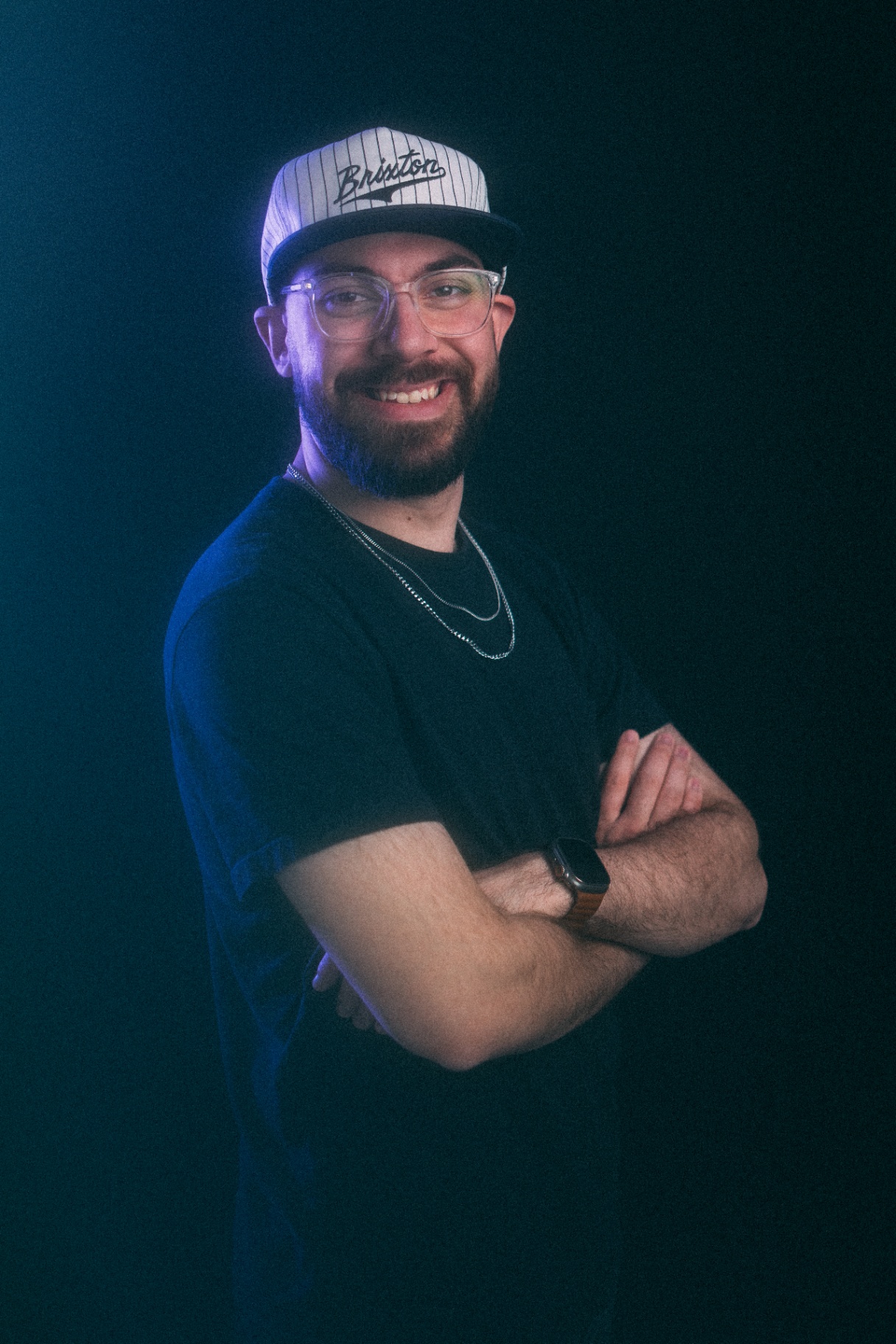 Christian smiling under blue light